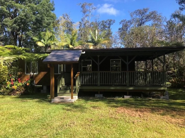 11-2972 Alii Papa St, Volcano, HI 96785 - view of front of home with a front yard and a metal roof