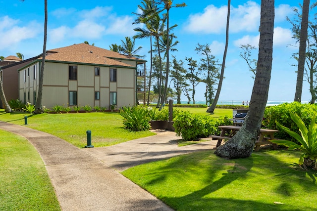 4-1250 Kuhio Hwy Unit G204, Kapaa, HI 96746 - view of property's community featuring a lawn