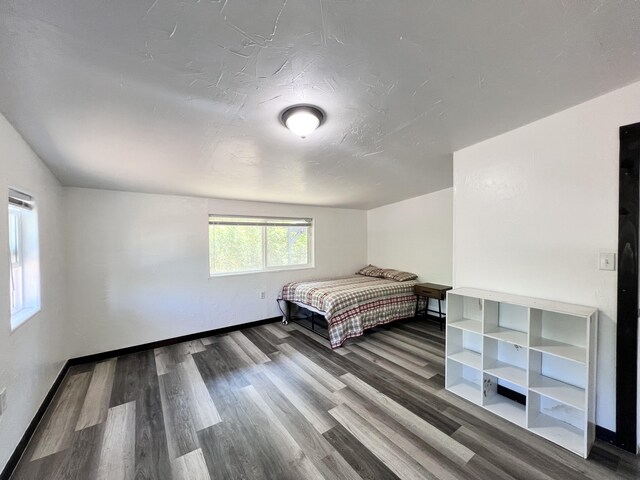 94-6347 Makai St, Naalehu, HI 96772 - bedroom with wood finished floors and baseboards
