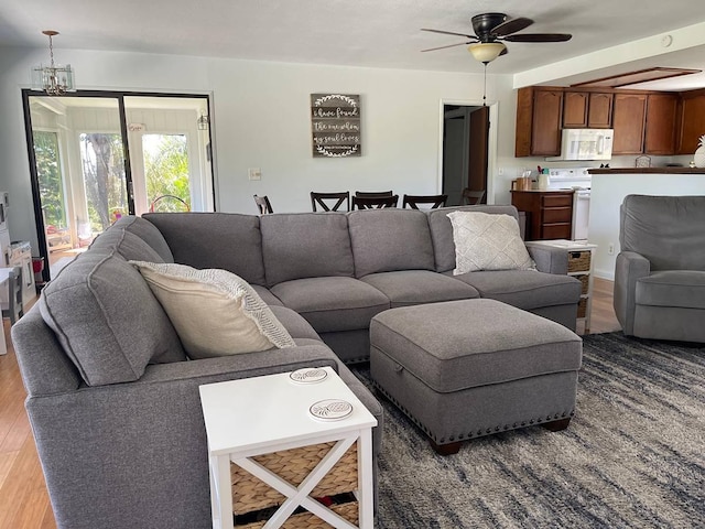 94-5868 Kanaloa Pl, Naalehu, HI 96772 - living area featuring light wood-style flooring and ceiling fan