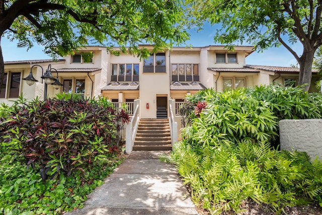 1901 Poipu Rd Unit 633, Koloa, HI 96756 - view of front of home featuring stucco siding and stairs