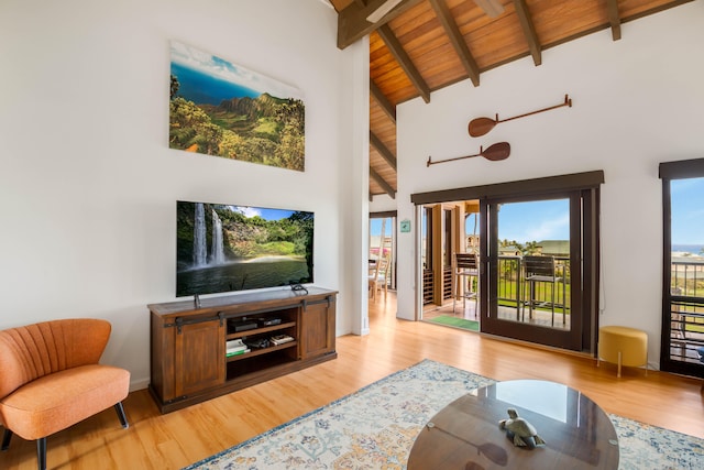 1901 Poipu Rd Unit 633, Koloa, HI 96756 - living area featuring light wood-style floors, a wood ceiling with exposed beams, and high vaulted ceiling
