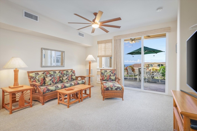 75-5919 Alii Dr Unit Jj2, Kailua-Kona, HI 96740 - carpeted living room with ceiling fan and plenty of natural light