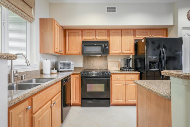 75-5919 Alii Dr Unit Jj2, Kailua-Kona, HI 96740 - kitchen with black appliances, light brown cabinets, light stone countertops, and light tile patterned floors
