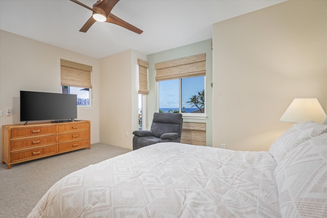 75-5919 Alii Dr Unit Jj2, Kailua-Kona, HI 96740 - carpeted bedroom with multiple windows and ceiling fan