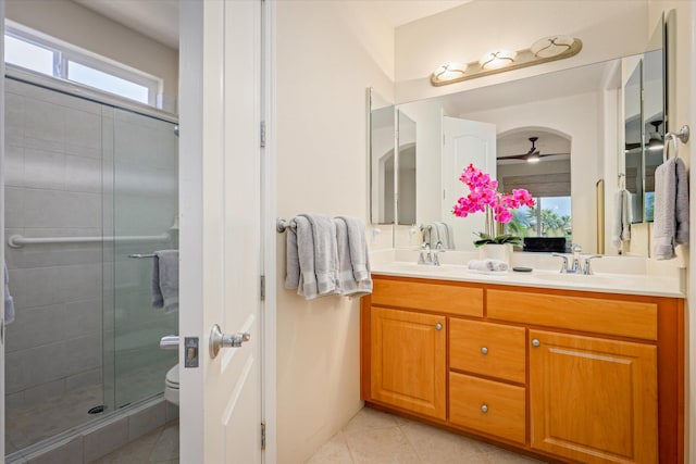 75-5919 Alii Dr Unit Jj2, Kailua-Kona, HI 96740 - bathroom featuring tile patterned flooring, double vanity, a shower stall, and ceiling fan