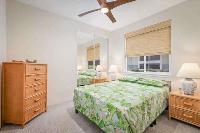 75-5919 Alii Dr Unit Jj2, Kailua-Kona, HI 96740 - bedroom with light colored carpet and a ceiling fan