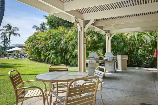 75-5919 Alii Dr Unit Jj2, Kailua-Kona, HI 96740 - view of patio / terrace featuring a grill and outdoor dining area