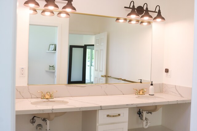 15-1393 29th Ave, Keaau, HI 96749 - bathroom featuring a sink and backsplash
