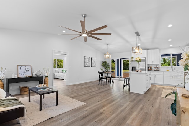 15-1698 5th Ave, Keaau, HI 96749 - living room featuring a ceiling fan, recessed lighting, lofted ceiling, and light wood-style floors