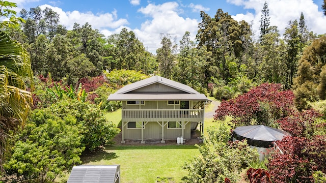 13-3401 Alapai St, Pahoa, HI 96778 - rear view of house featuring a yard