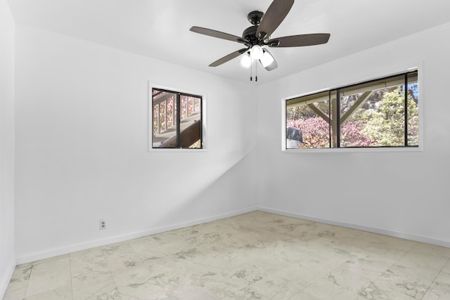 13-3401 Alapai St, Pahoa, HI 96778 - spare room featuring marble look tiles and ceiling fan