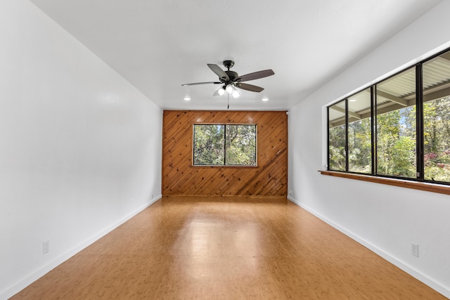 13-3401 Alapai St, Pahoa, HI 96778 - unfurnished room with wooden walls, recessed lighting, and a ceiling fan