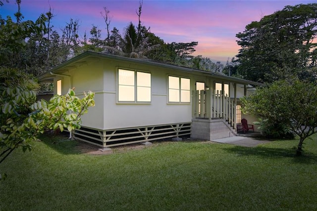 14-3342 Kaululaau Rd Unit 3, Pahoa, HI 96778 - view of front of house featuring a lawn