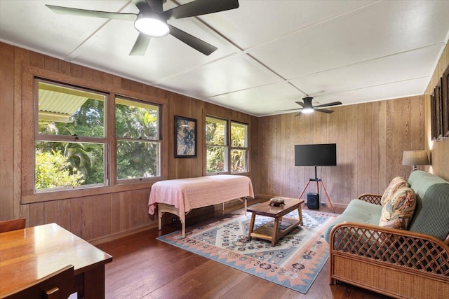14-3342 Kaululaau Rd Unit 3, Pahoa, HI 96778 - bedroom featuring wood walls, hardwood / wood-style flooring, and ceiling fan