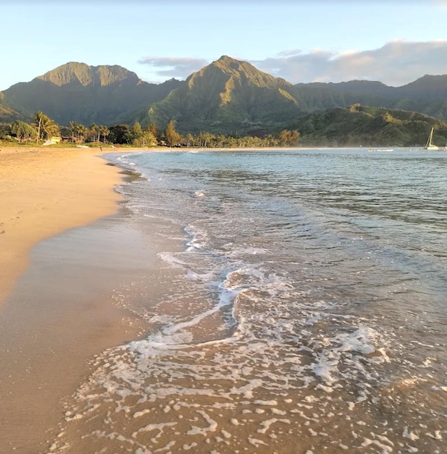 3811 Edward Rd Unit 3304, Princeville, HI 96722 - water view with a mountain backdrop