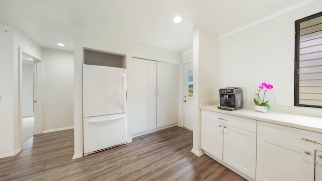 328 Molo St, Kapaa, HI 96746 - kitchen with freestanding refrigerator, dark wood-style floors, white cabinetry, recessed lighting, and light countertops