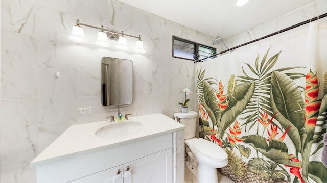328 Molo St, Kapaa, HI 96746 - full bathroom featuring tile walls, vanity, and a shower with curtain