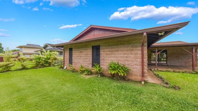 328 Molo St, Kapaa, HI 96746 - view of property exterior featuring a yard and a patio