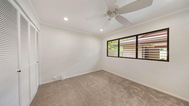 328 Molo St, Kapaa, HI 96746 - unfurnished bedroom with carpet, a closet, crown molding, recessed lighting, and a ceiling fan
