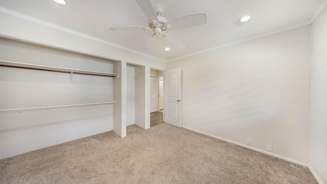 328 Molo St, Kapaa, HI 96746 - unfurnished bedroom featuring carpet, recessed lighting, crown molding, ceiling fan, and a closet