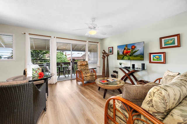 75-6008 Alii Dr Unit 219, Kailua-Kona, HI 96740 - living area with light wood-type flooring and a ceiling fan