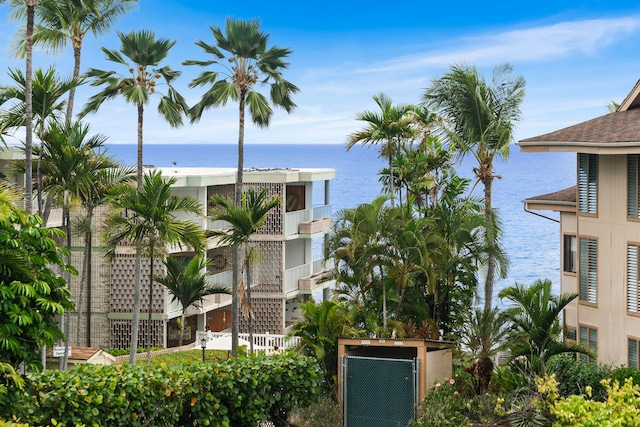 75-6008 Alii Dr Unit 219, Kailua-Kona, HI 96740 - view of building exterior featuring a water view