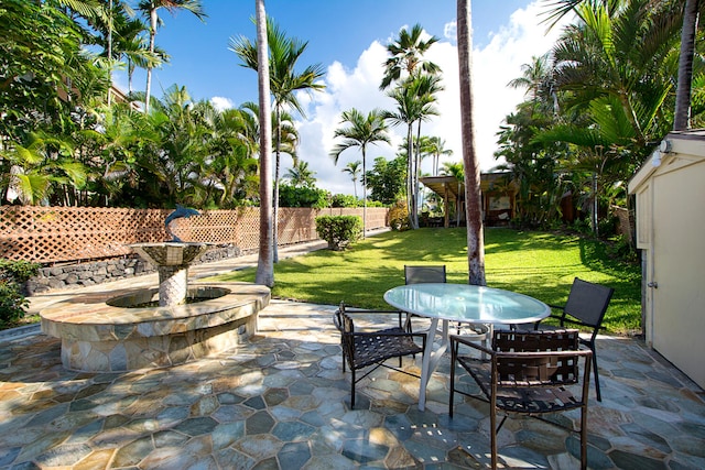 75-6008 Alii Dr Unit 219, Kailua-Kona, HI 96740 - view of patio / terrace featuring outdoor dining area