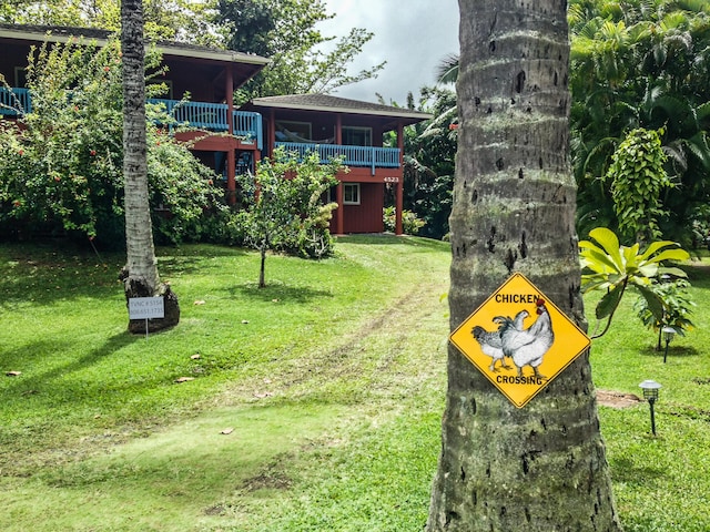 4523 Uku Lii Pl, Hanalei, HI 96714 - view of green lawn with a wooden deck