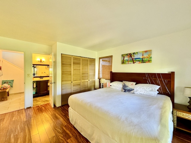4523 Uku Lii Pl, Hanalei, HI 96714 - bedroom with hardwood / wood-style flooring, a closet, and connected bathroom