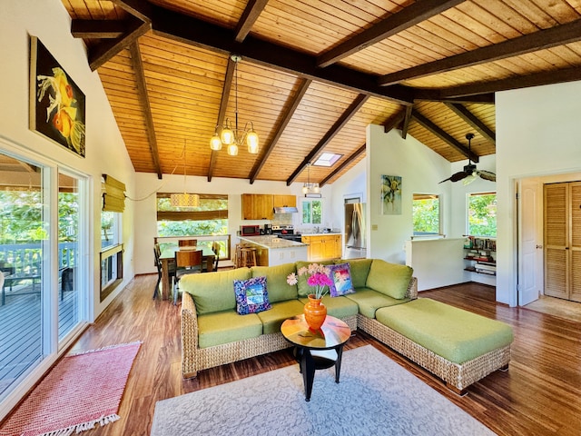 4523 Uku Lii Pl, Hanalei, HI 96714 - living room featuring a wooden ceiling with exposed beams, high vaulted ceiling, light wood-style floors, a chandelier, and healthy amount of natural light