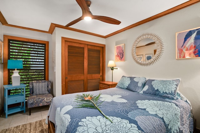 2253 Poipu Rd Unit 320, Koloa, HI 96756 - tiled bedroom with ornamental molding, a closet, and ceiling fan