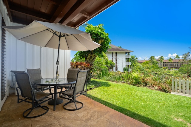 2253 Poipu Rd Unit 320, Koloa, HI 96756 - view of patio featuring outdoor dining area