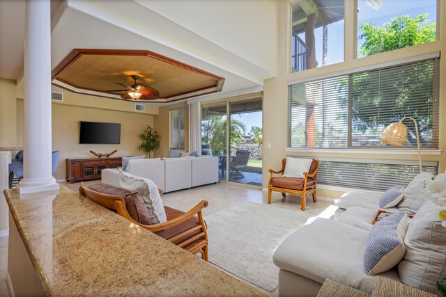 68-1122 Na Ala Hele Rd Unit E4, Kamuela, HI 96743 - living area with ornate columns, plenty of natural light, tile patterned floors, and ceiling fan