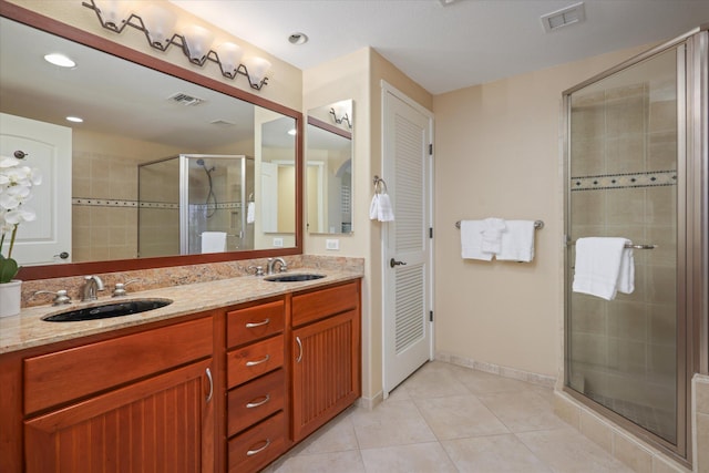 68-1122 Na Ala Hele Rd Unit E4, Kamuela, HI 96743 - bathroom featuring double vanity, a stall shower, and tile patterned floors