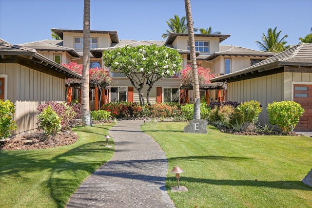 68-1122 Na Ala Hele Rd Unit E4, Kamuela, HI 96743 - view of front of property with a front yard and a tile roof