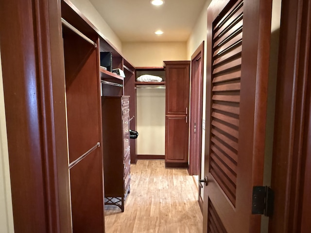62-3600 Amaui Pl Unit 345, Kamuela, HI 96743 - walk in closet featuring light wood finished floors