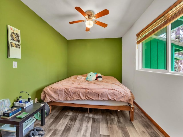 11-3057 Anuhea St, Volcano, HI 96785 - bedroom with wood finished floors and a ceiling fan