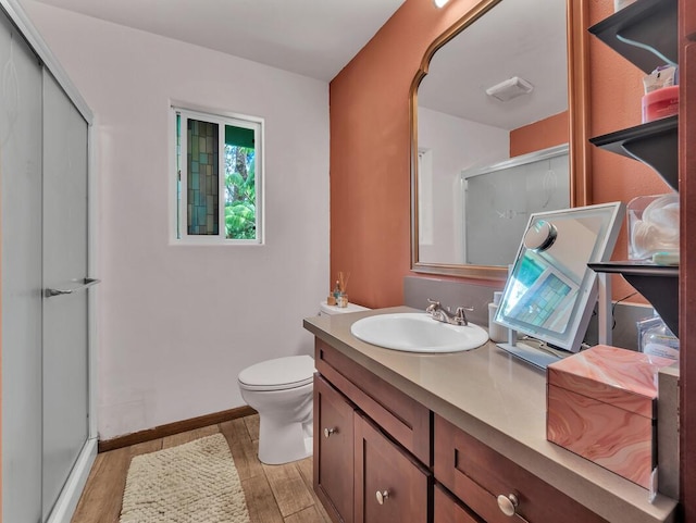 11-3057 Anuhea St, Volcano, HI 96785 - bathroom featuring wood finished floors, vanity, and a shower stall