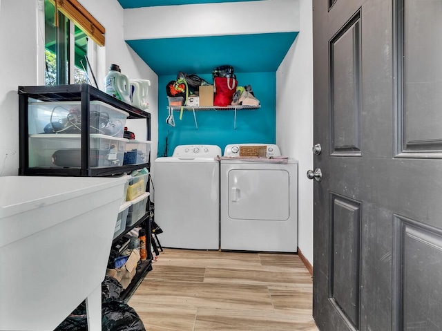 11-3057 Anuhea St, Volcano, HI 96785 - laundry room featuring washing machine and dryer and wood finished floors