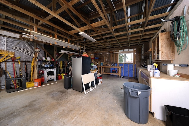 17-436 Ipuaiwaha St, Keaau, HI 96749 - garage featuring a workshop area and washer / clothes dryer