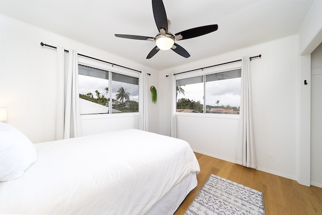 17-436 Ipuaiwaha St, Keaau, HI 96749 - bedroom featuring wood finished floors and a ceiling fan