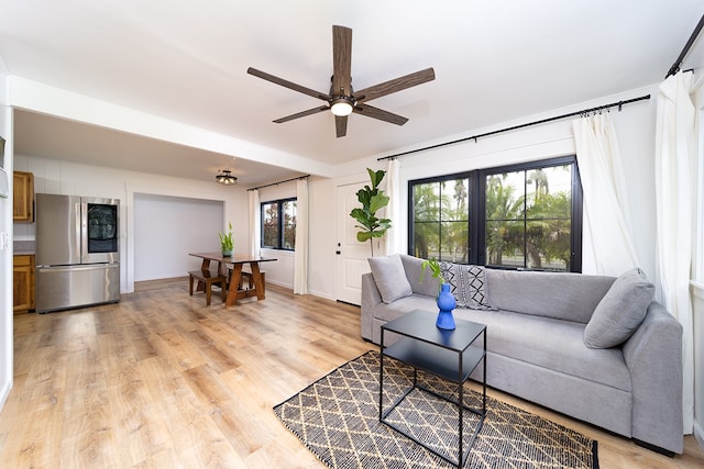 17-436 Ipuaiwaha St, Keaau, HI 96749 - living room featuring ceiling fan and light wood-type flooring