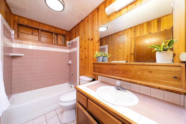 17-436 Ipuaiwaha St, Keaau, HI 96749 - full bath featuring vanity, tile patterned flooring, wood walls, and shower / washtub combination