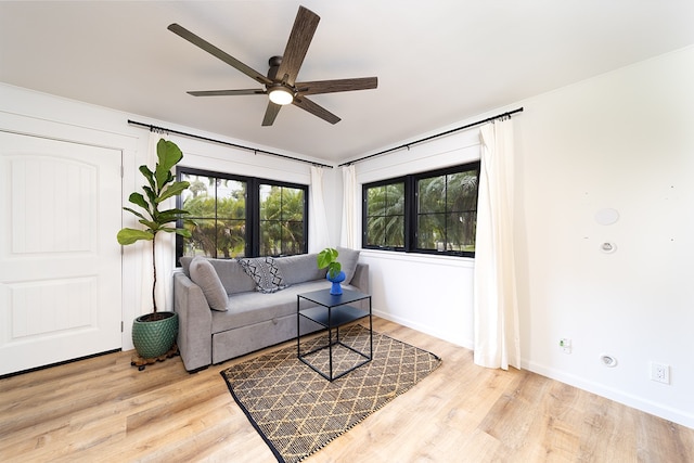 17-436 Ipuaiwaha St, Keaau, HI 96749 - living room featuring a ceiling fan and wood finished floors