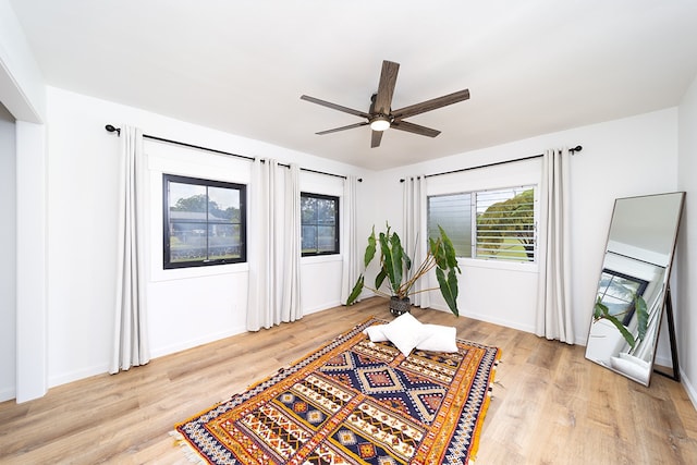 17-436 Ipuaiwaha St, Keaau, HI 96749 - living area with ceiling fan and light wood-style floors