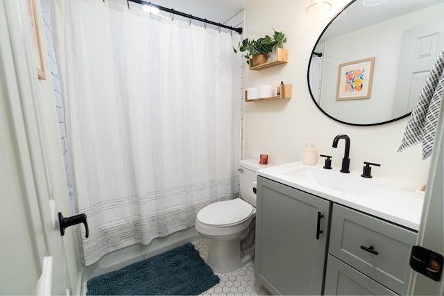 75-5863 Kuakini Hwy Unit 104, Kailua-Kona, HI 96740 - bathroom featuring vanity, tile patterned floors, and shower / tub combo with curtain