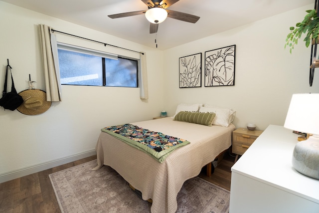 75-5863 Kuakini Hwy Unit 104, Kailua-Kona, HI 96740 - bedroom with wood finished floors and ceiling fan