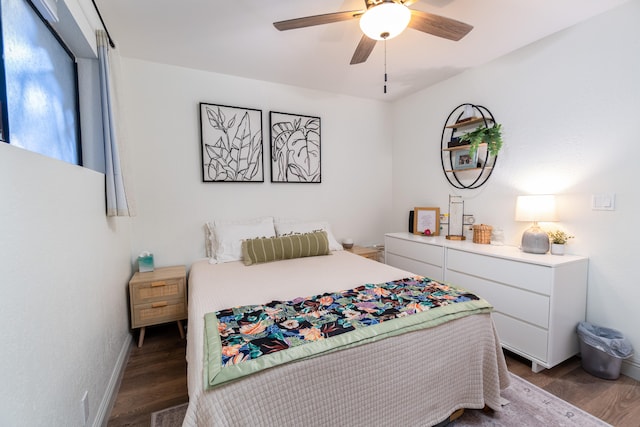 75-5863 Kuakini Hwy Unit 104, Kailua-Kona, HI 96740 - bedroom with wood finished floors and ceiling fan