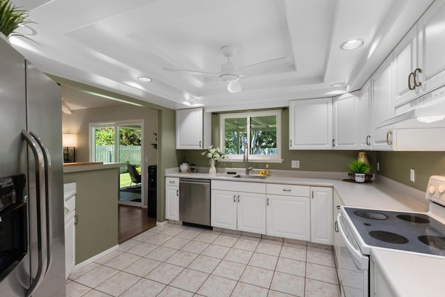 68-1740 Akaula St, Waikoloa, HI 96738 - kitchen featuring stainless steel appliances, under cabinet range hood, a ceiling fan, light countertops, and plenty of natural light